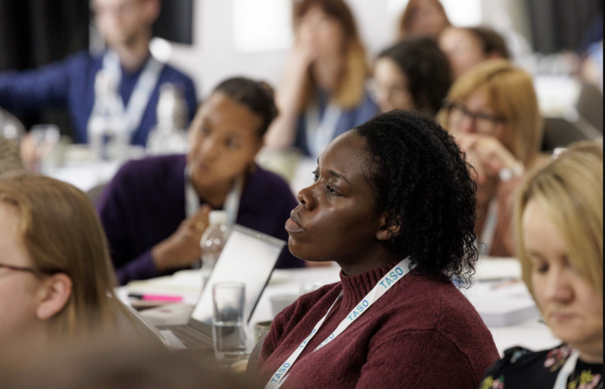 Image of people at the 2024 TASO annual conference engaged in a session.